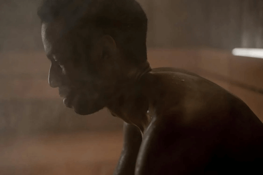 man sweating in a sauna