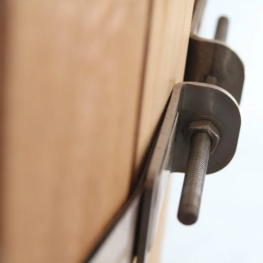 Cedar staves with a stainless steel through fitting