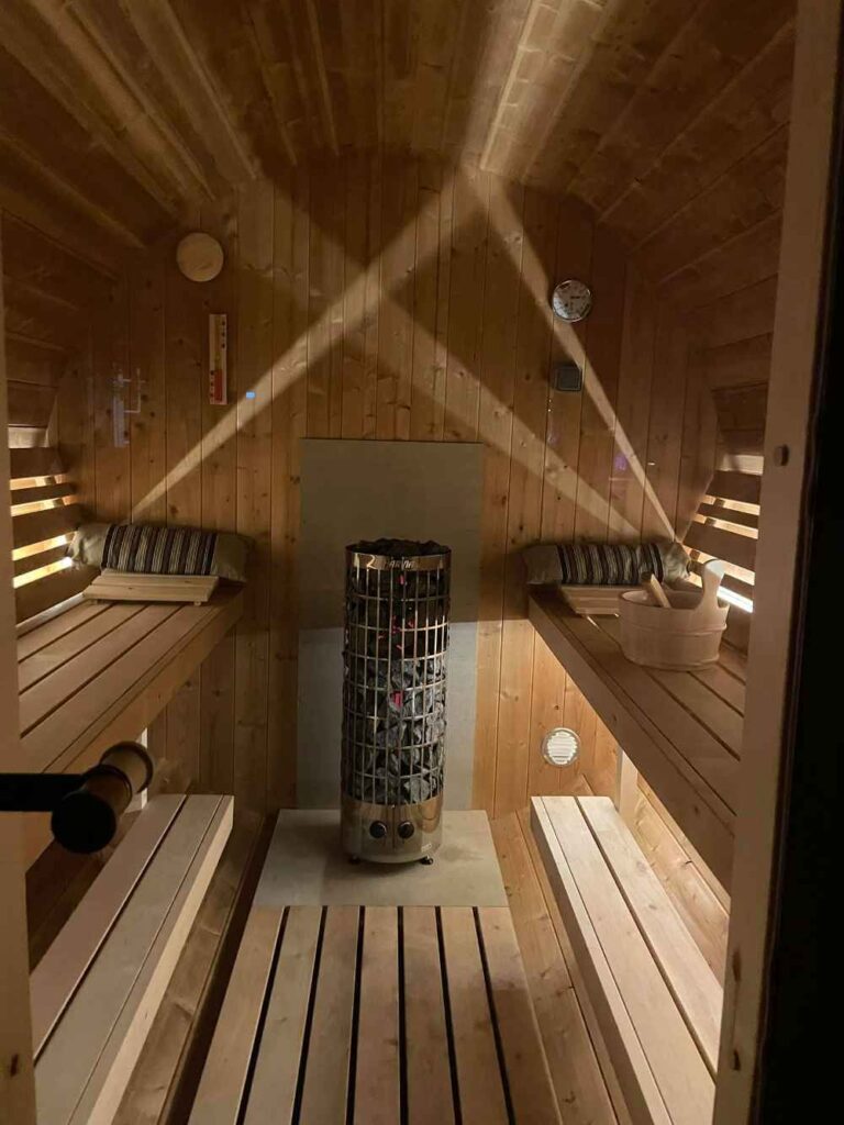 barrel sauna with split level benches