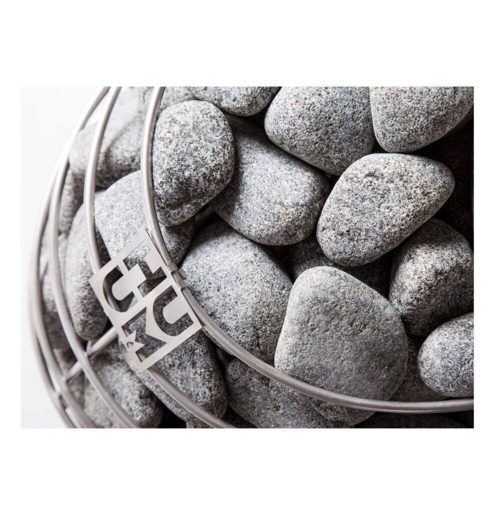 Sauna stones packed inside the stainless steel cage of the HUUM Drop