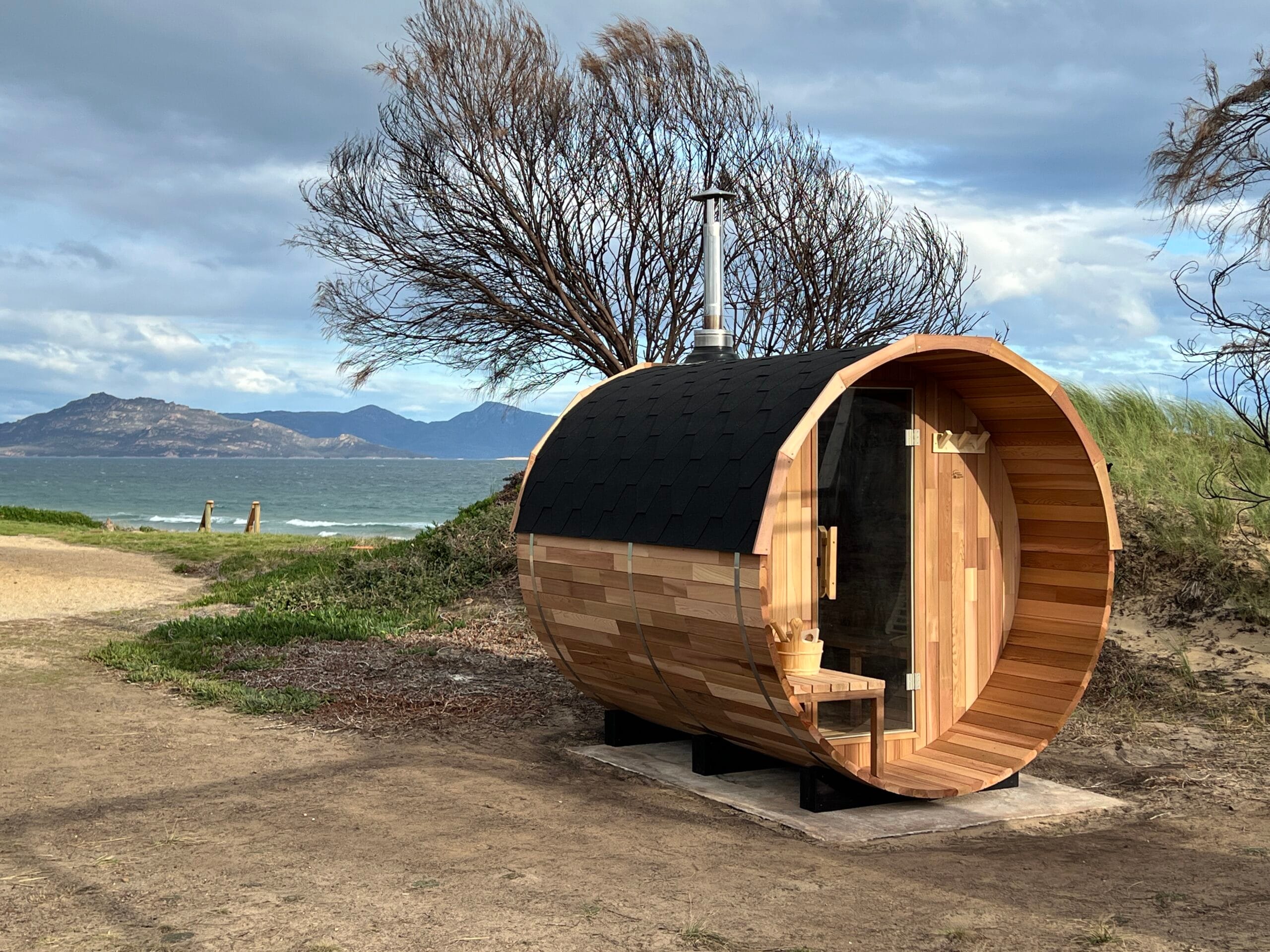 Cedar barrel sauna on the coast at Dolphin Sands, Tasmania