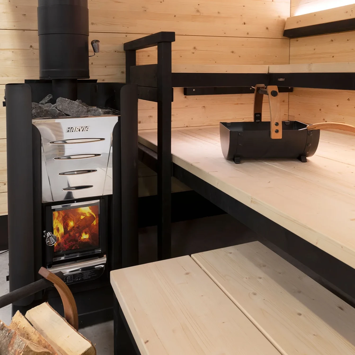 Harvia wood burning heater beside a sauna bench