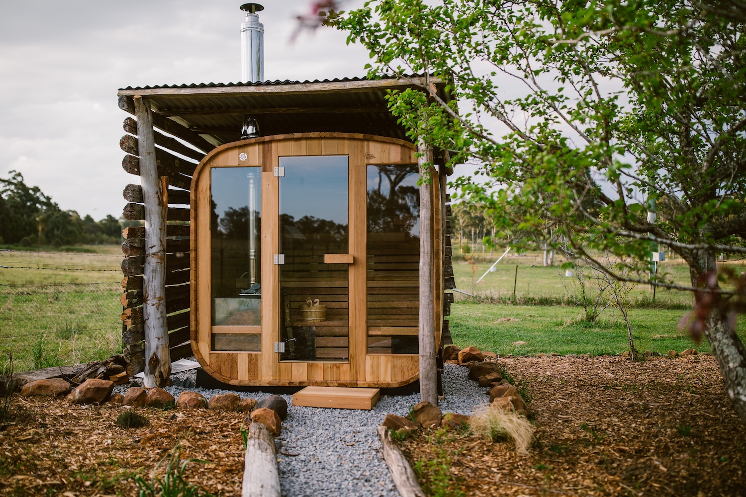 Shym log cabin sauna installed in an Australian garden