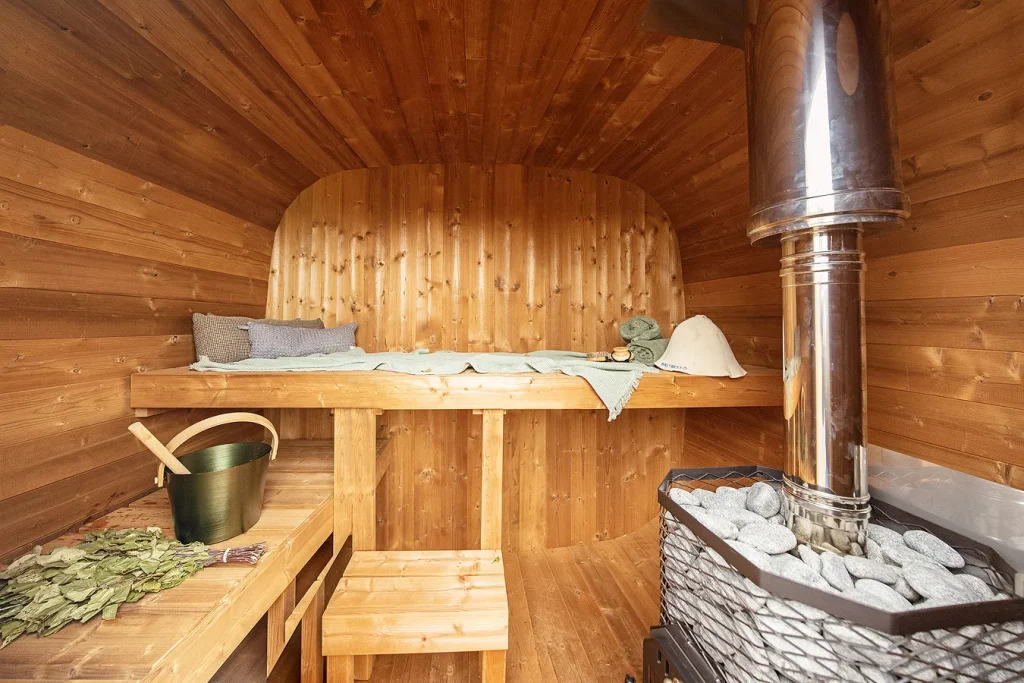Cozy 12 OG glowing during an evening sauna session in Launceston