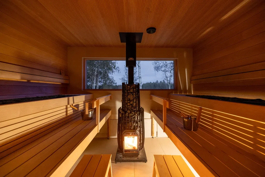 Cozy 12 OG glowing during an evening sauna session in Launceston.