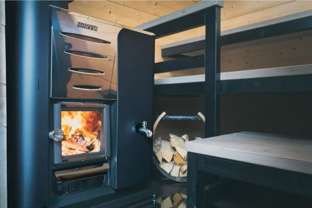 Harvia wood burning heater installed in a sauna