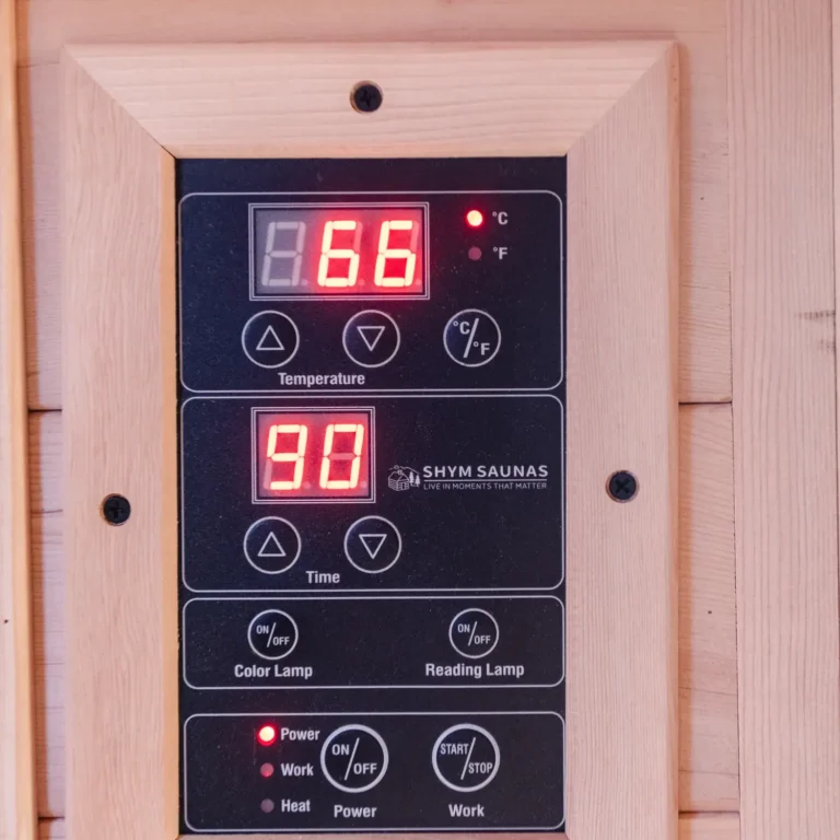 Control panel of the Aura Infrared Sauna showing temperature and timer