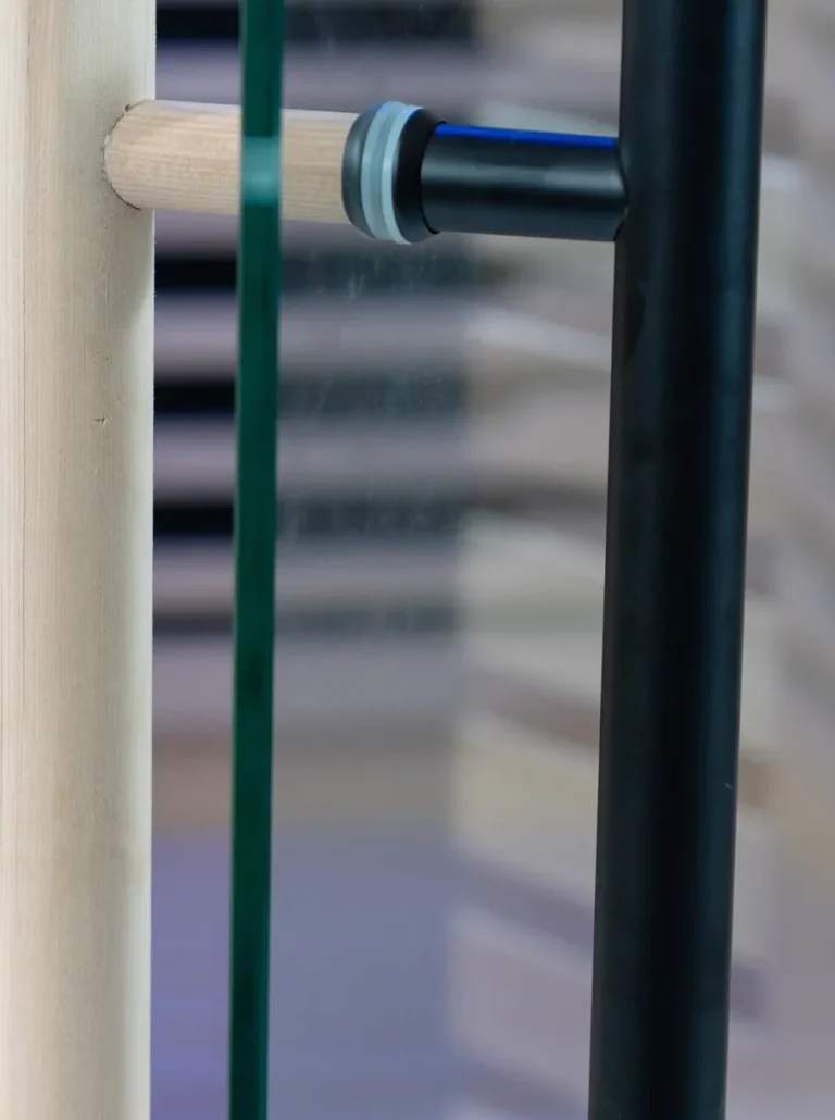 Tempered glass door handles on the Aura Infrared Sauna, close up