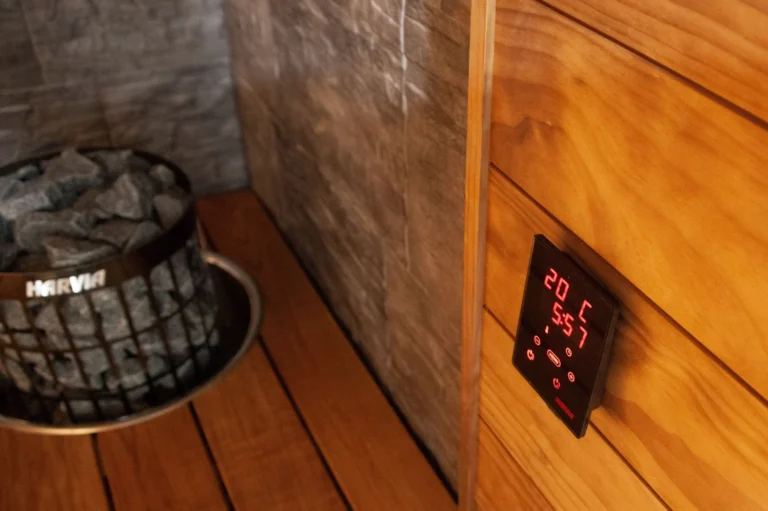 Harvia Cilindro PC70E black steel heater with a separate wall mounted control panel