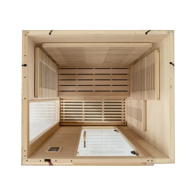 Overhead view inside the SHYM Aura 2-person infrared sauna showing the bench and floor heater layout