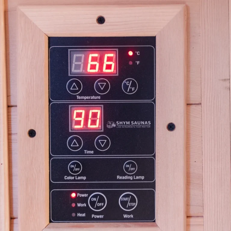 Digital control panel of the SHYM Aura infrared sauna showing temperature and timer