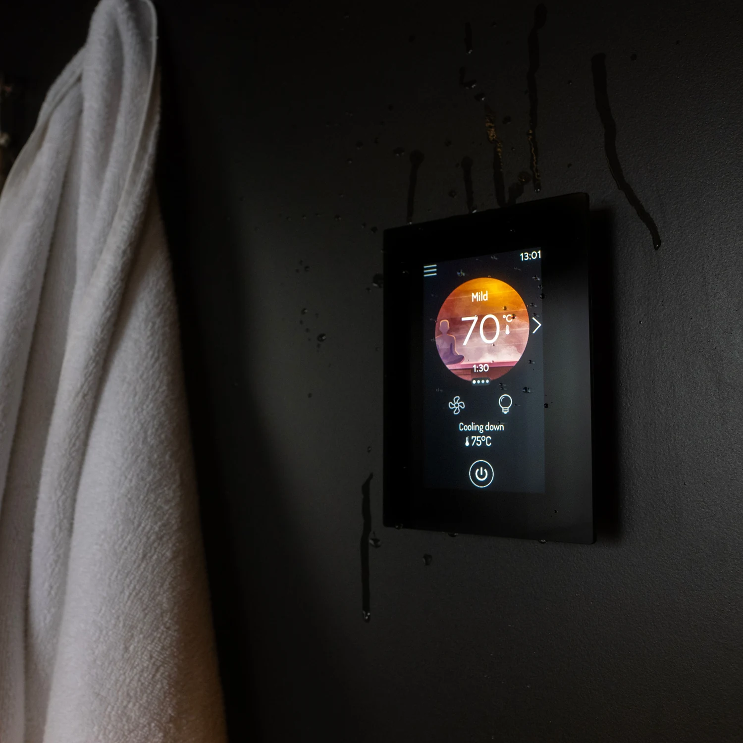 Close up of the Harvia Fenix FX001XW touchscreen showing the temperature and timer display