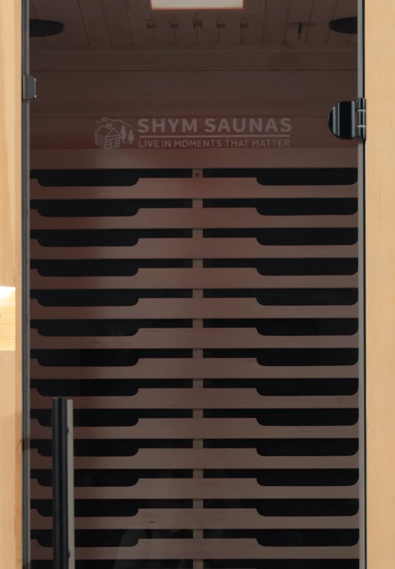 Grey tinted glass door of the Aura Infrared Sauna 1 Person Premium, close up