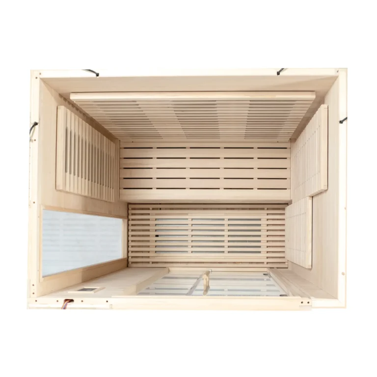 Overhead view inside the Aura Infrared Sauna 3 Person showing the bench and floor heater layout