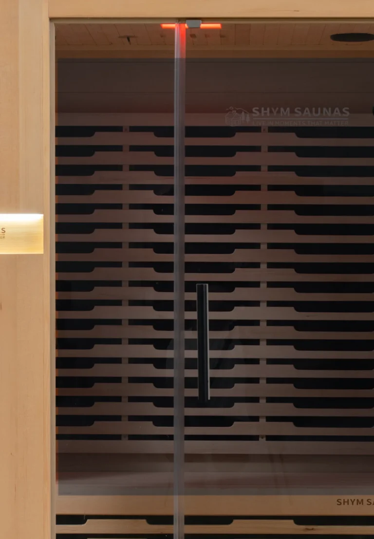 Grey tinted glass door of the Aura Infrared Sauna 3 Person Premium, close up