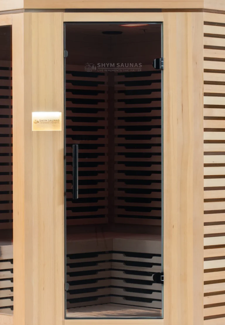 Grey tinted glass door of the Aura Infrared Sauna 4 Person Premium, close up
