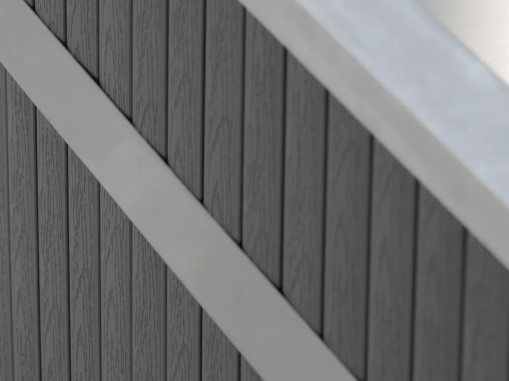 Close view of the stainless steel rim meeting the PVC cladding