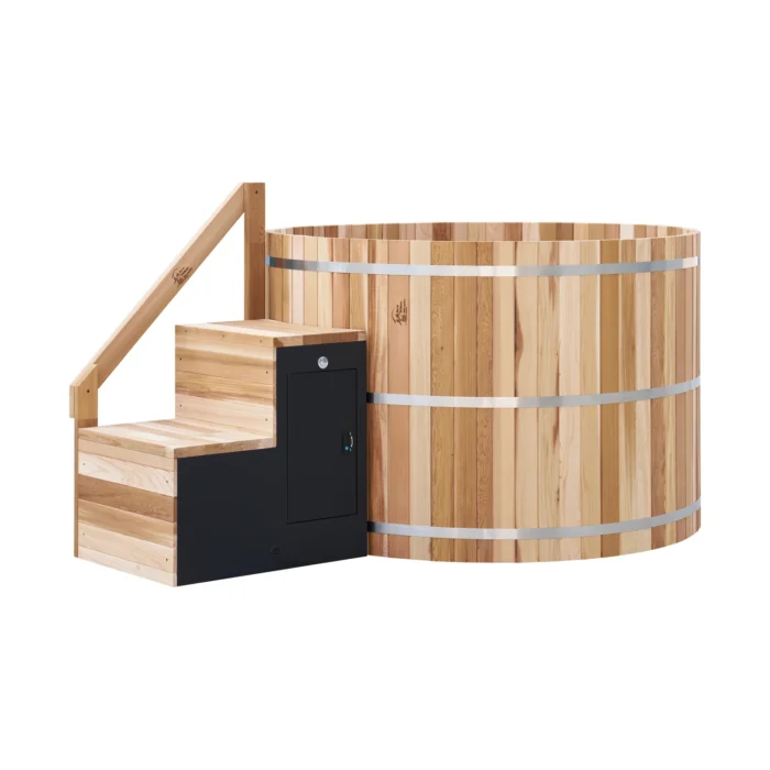 Three quarter view of the cedar hot tub with steps and equipment cabinet