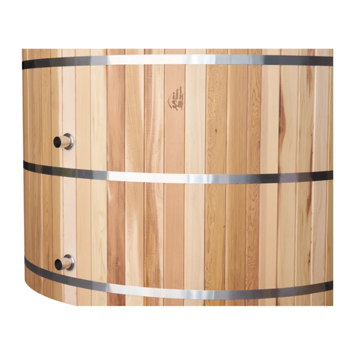 Cedar hot tub exterior detail showing the stainless steel bands and fittings