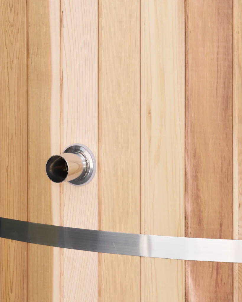 Western red cedar staves with a stainless steel band and outlet fitting