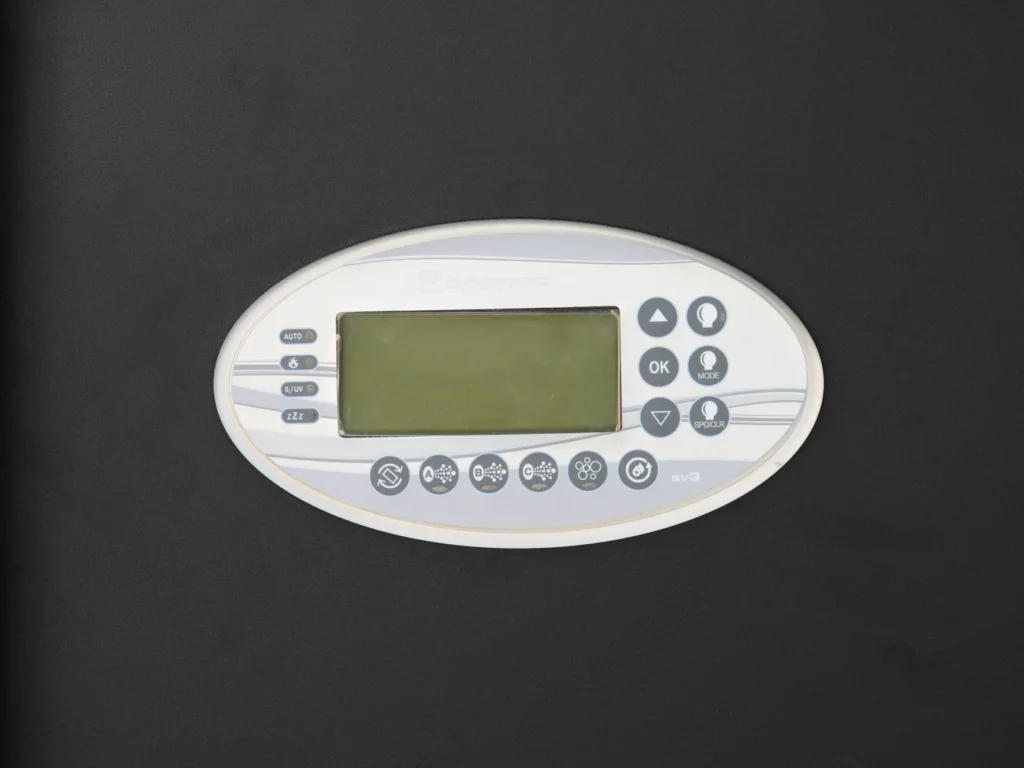 The SpaNET touch pad control panel on the cedar hot tub