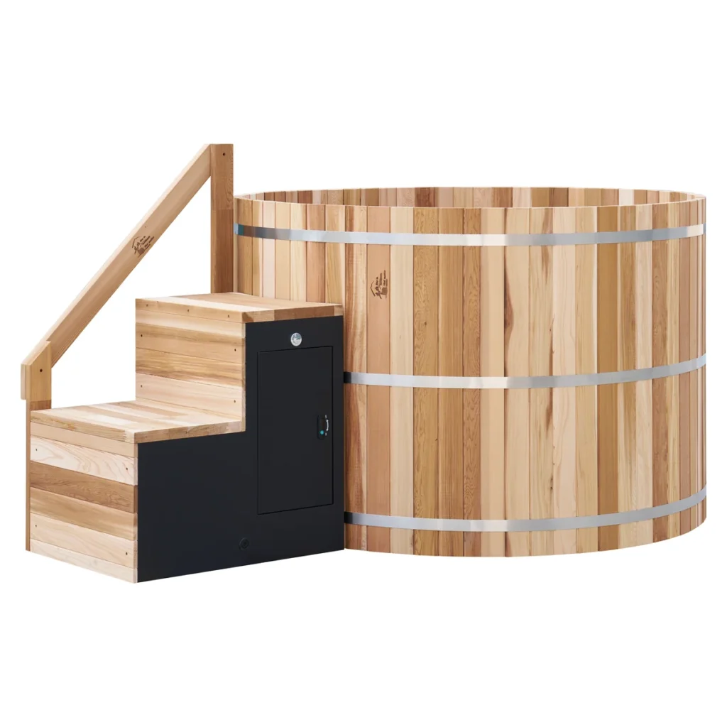 The cedar hot tub with its steps and equipment cabinet