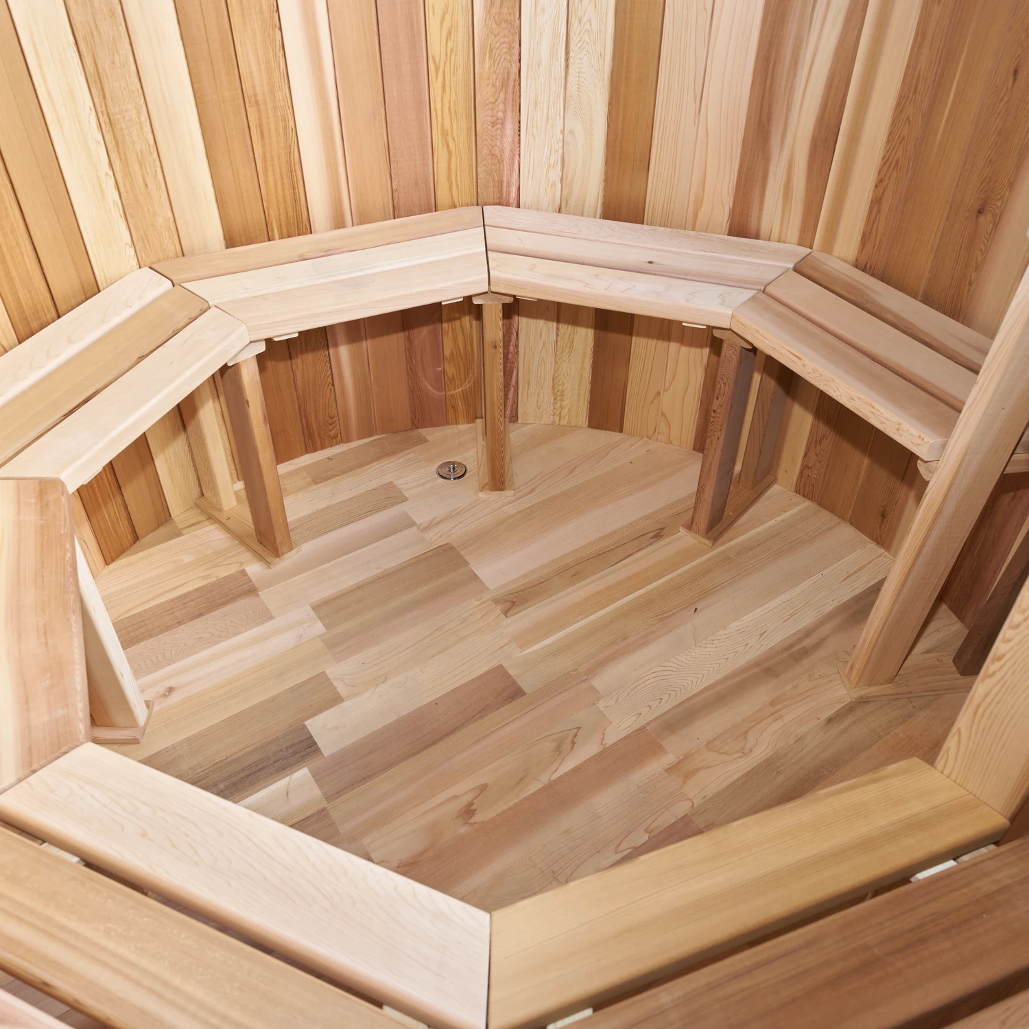 Bench ring and cedar floor inside the hot tub