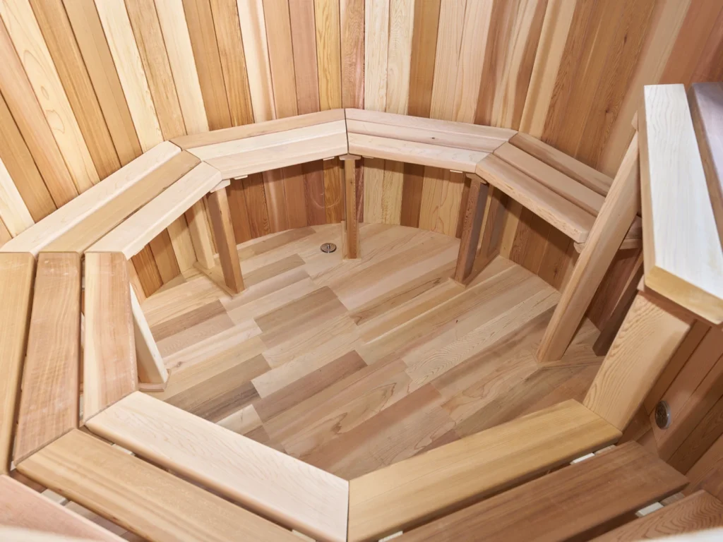 Cedar floor and bench seating inside the hot tub
