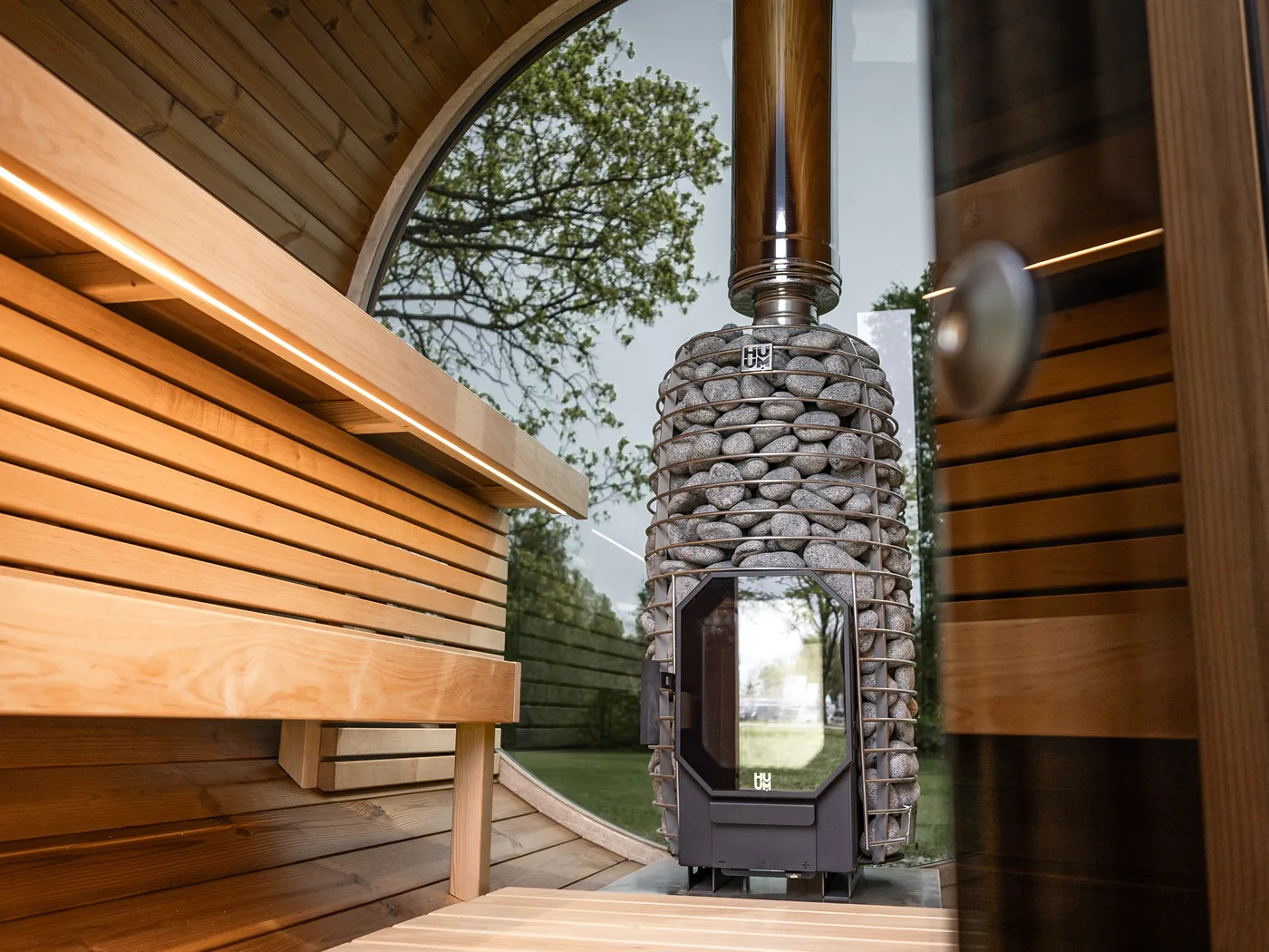 Bench, stove and window inside the Lerra Plus